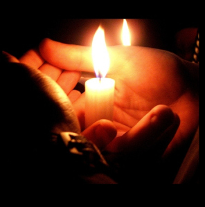 hands-holding-a-candle